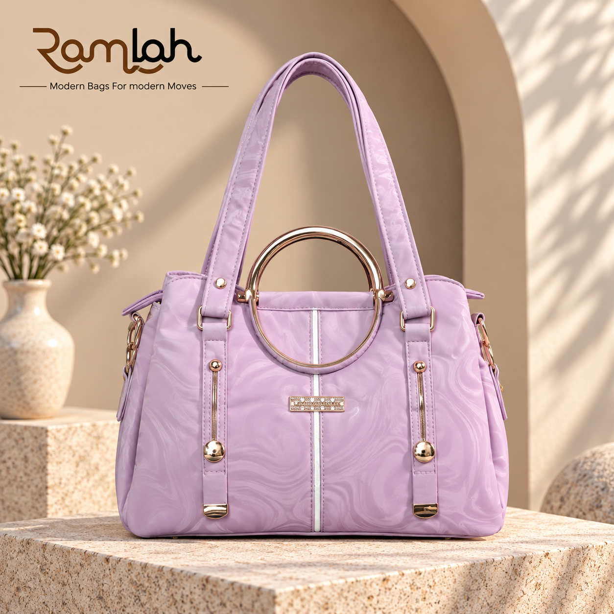 Marble Luxe Shoulder Bag for women in pink with a marble pattern, circular metal handle detail, and gold-tone hardware