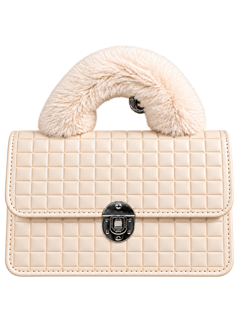 White quilted handbag with gold-tone hardware on an orange studio pedestal