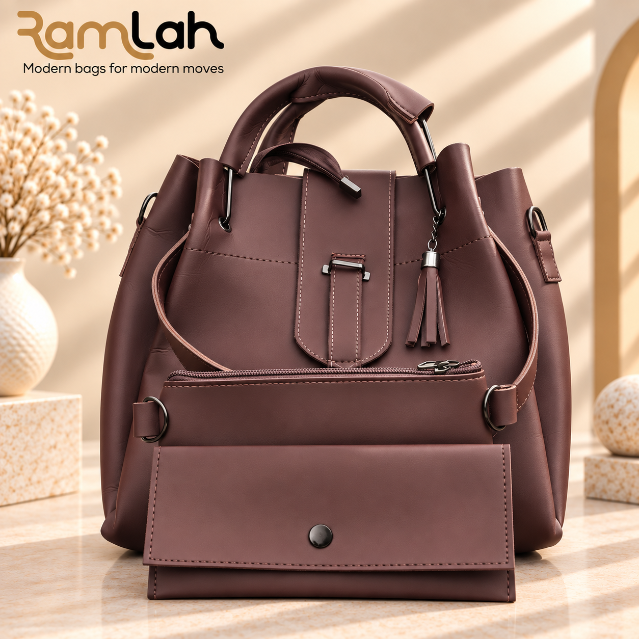 Chocolate handbag with top handles, detachable shoulder strap, front zip pocket, and tassel detail Sage green handbag with top handles, detachable shoulder strap, front zip pocket, and tassel detail